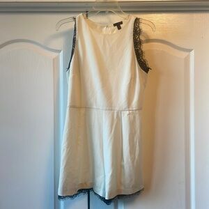 Cream and black romper